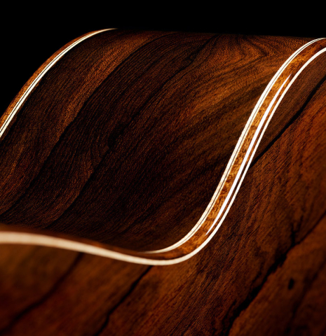 The side, back, binding and purflings of a 2024 Marco Bortolozzo classical guitar made of spruce and ziricote