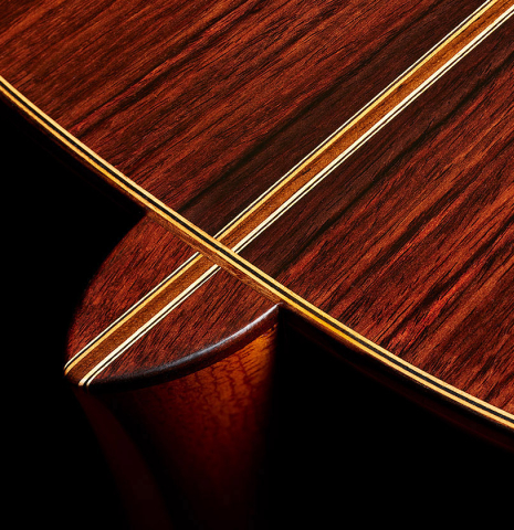 The heel, back binding and purflings of a 2024 Mario Grimaldi "1963 Daniel Friederich, ex Ida Presti" classical guitar made of spruce and African rosewood