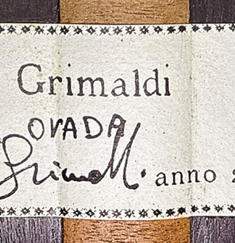 The label of a 2024 Mario Grimaldi "1963 Daniel Friederich, ex Ida Presti" classical guitar made of spruce and African rosewood