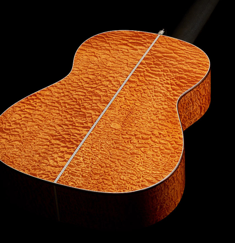 The back and sides of a 2025 Marco Bortolozzo classical guitar made of spruce and pomellè mahogany