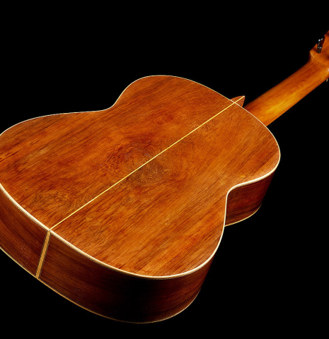 The back and sides of a 1947 Marcelo Barbero w/pegs classical guitar made of spruce and CSA rosewood