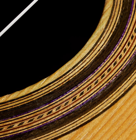 Detailed closeup of the rosette of a 1947 Marcelo Barbero w/pegs classical guitar made of spruce and CSA rosewood