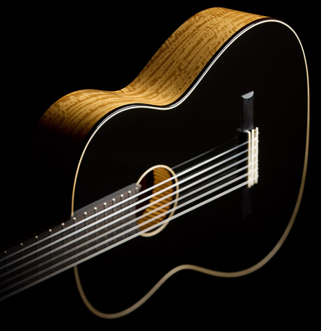 The soundboard and sides of a 2026 Marco Bortolozzo "Gold Record - REG Limited Edition" classical guitar made of spruce and satinwood