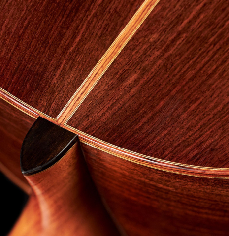 The back and heel of a 2016 Michel Belair classical guitar made of cedar and Indian rosewood