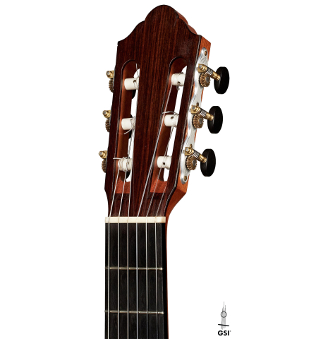 The headstock of a 2016 Michel Belair classical guitar made of cedar and Indian rosewood