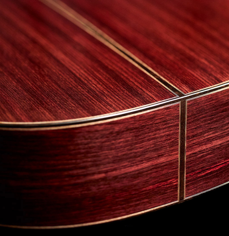 The back and sides of a 2022 Michel Belair &quot;Hommage a Daniel Friederich&quot; classical guitar made of cedar and Indian rosewood