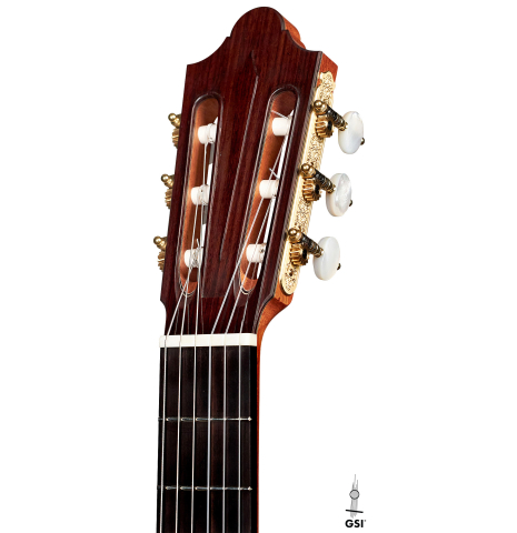 The headstock of a 2022 Michel Belair "Hommage a Daniel Friederich" classical guitar made of cedar and Indian rosewood