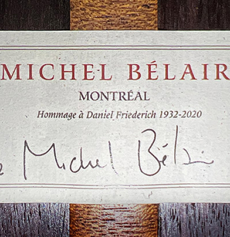 The label of a 2022 Michel Belair &quot;Hommage a Daniel Friederich&quot; classical guitar made of cedar and Indian rosewood