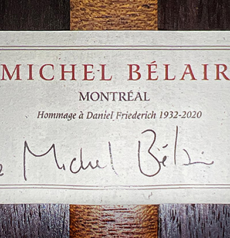 The label of a 2022 Michel Belair "Hommage a Daniel Friederich" classical guitar made of cedar and Indian rosewood