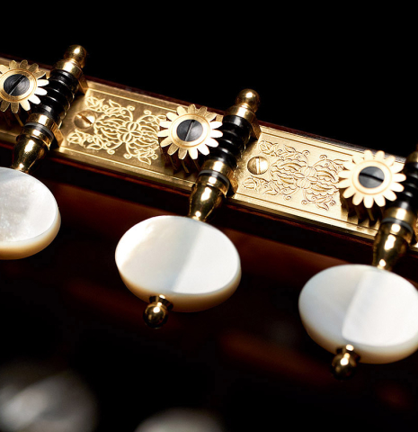 The machine heads of a 2022 Michel Belair "Hommage a Daniel Friederich" classical guitar made of cedar and Indian rosewood