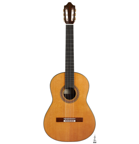 The front of a 2024 Michel Belair "Hommage a Daniel Friederich" classical guitar made of cedar and Indian rosewood