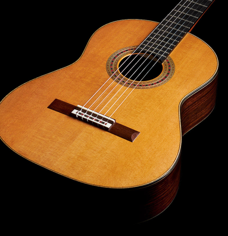 The soundboard of a 2024 Michel Belair "Hommage a Daniel Friederich" classical guitar made of cedar and Indian rosewood