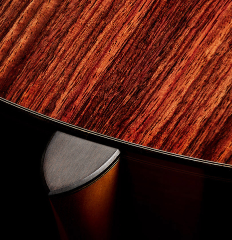 The heel, back binding and purfling of a 2025 Michel Belair "Double Top" classical guitar made of cedar and Indian rosewood
