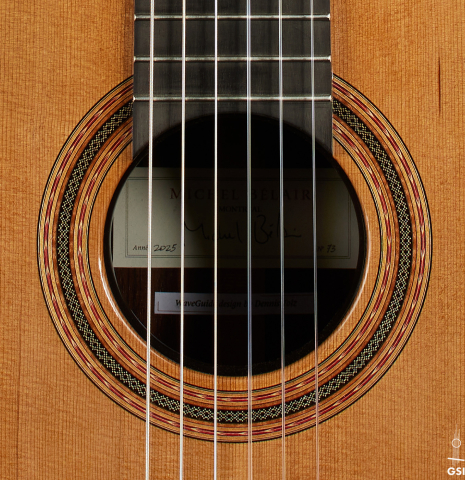 The rosette of a 2025 Michel Belair "Double Top" classical guitar made of cedar and Indian rosewood