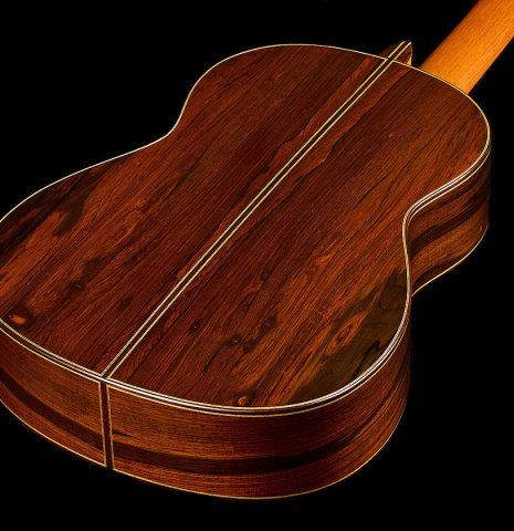 The back and sides of a 1999 Jose Lopez Bellido classical guitar made of spruce and CSA rosewood
