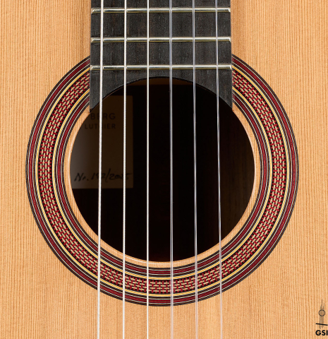 The rosette of a 2025 Tobias Berg classical guitar made of cedar and Indian rosewood