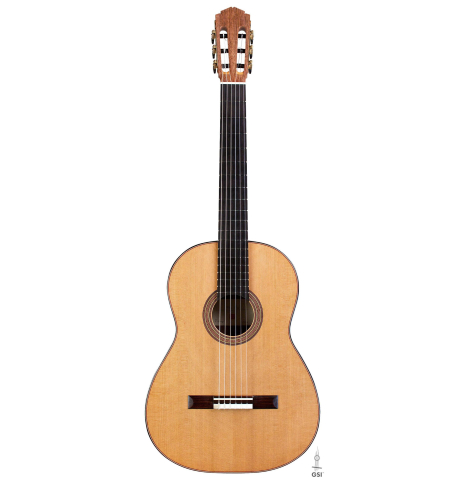 The front of a 2016 Tobias Berg classical guitar made of cedar and walnut