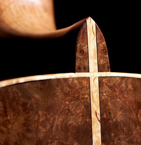 The heel of a 2022 Tobias Berg classical guitar made of cedar and European walnut.
