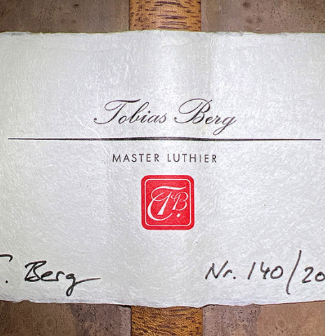 The label of a 2022 Tobias Berg classical guitar made of cedar and European walnut.