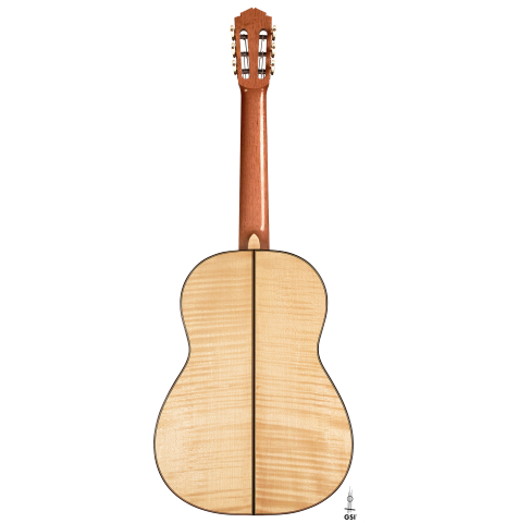 The back of a 2023 Tobias Berg classical guitar made of spruce and flamed maple on a white background.