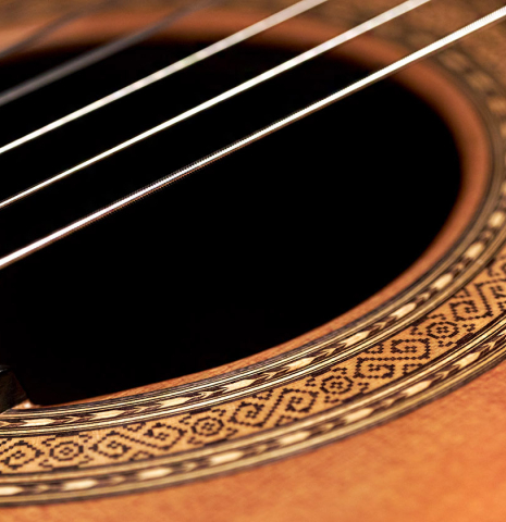 The rosette of a 1995 Paulino Bernabe (ex Marc Teicholz)  classical guitar made with cedar and CSA rosewood.
