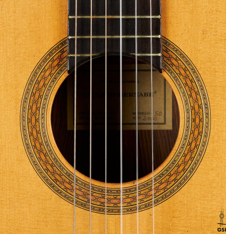 The rosette of a 2000 Paulino Bernabe "50" classical guitar made of spruce and CSA rosewood