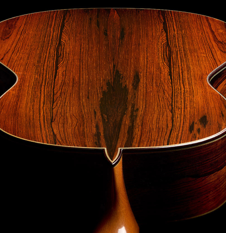 The heel, back binding and purfling of a 2001 Paulino Bernabe "Imperial" classical guitar made of spruce and CSA rosewood