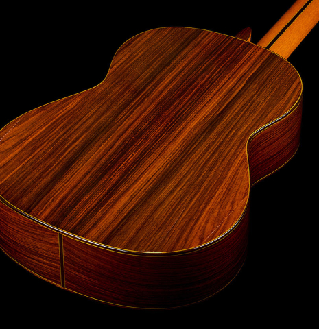 The back and sides of a 1972 Paulino Bernabe classical guitar made of cedar and Indian rosewood