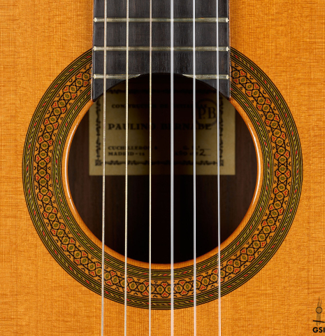 The rosette of a 1972 Paulino Bernabe classical guitar made of cedar and Indian rosewood