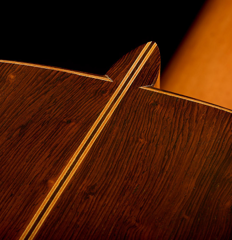 The heel, back binding and purfling of a 1997 Tom Blackshear "1976 Rodriguez" classical guitar made of spruce and CSA rosewood