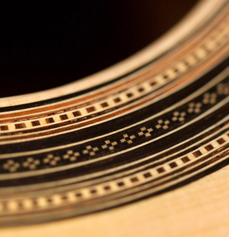 This is a close-up of the rosette of a 2021 Edmund Blöchinger SP/CSAR classical guitar