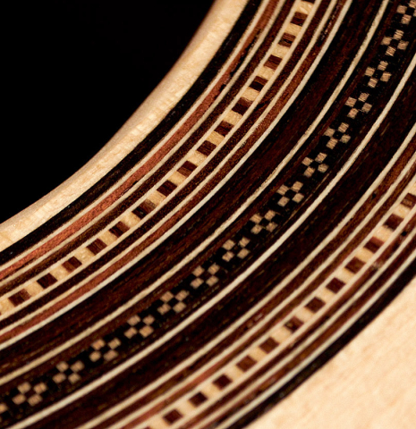 This is a close-up of the rosette of a 2022 Edmund Blöchinger SP/CSAR classical guitar