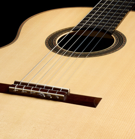 View of the soundboard from the bridge of a 2025 Edmund Blöchinger "Llobet" classical guitar made of spruce and CSA rosewood