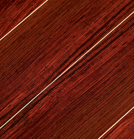 Detail of the back and purflings of a 2023 Edmund Blöchinger "Llobet" classical guitar made with cedar top and CSA rosewood back and sides.