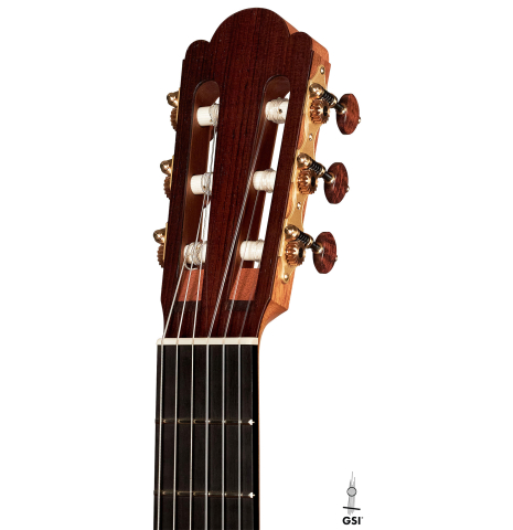 The headstock of a 2023 Edmund Blöchinger "Llobet" classical guitar made with cedar top and CSA rosewood back and sides on a white background.
