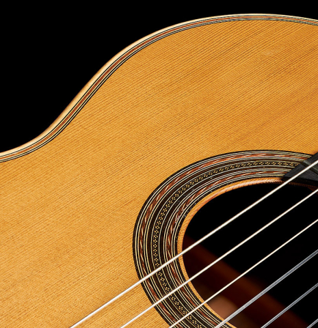 The top and rosette of a 2008 Edmund Blochinger "Llobet" classical guitar made of cedar and CSA rosewood