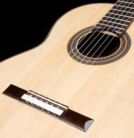 The soundboard of a 2017 Florian Blöchinger classical guitar made of spruce and CSA rosewood