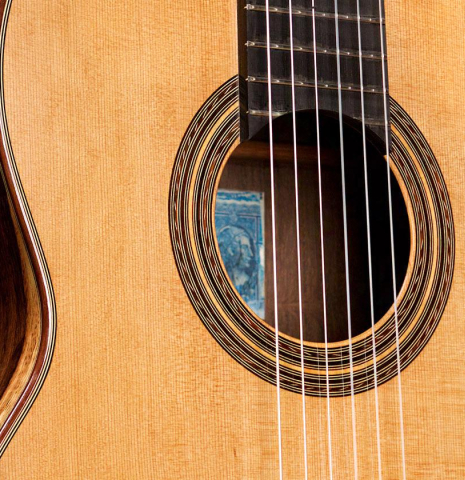 The soundboard and rosette of a 2019 Florian Blöchinger classical guitar made of cedar and CSA rosewood
