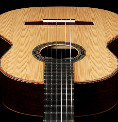 The top, fingerboard and sides of a 2024 Edmund Blöchinger "Dome" classical guitar made of spruce and CSA rosewood