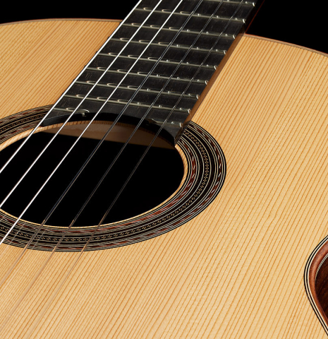 The soundboard of a 2024 Edmund Blöchinger "Dome" classical guitar made of spruce and CSA rosewood
