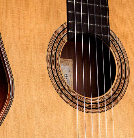The soundboard of a 1997 Edmund Blöchinger classical guitar made with spruce top and Indian rosewood back and sides.