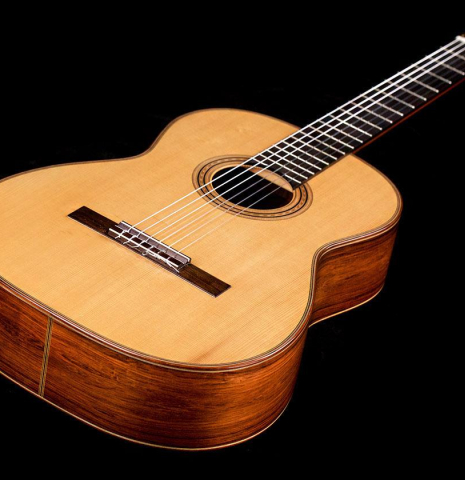 The front of a 1997 Edmund Blöchinger classical guitar made with spruce top and Indian rosewood back and sides.