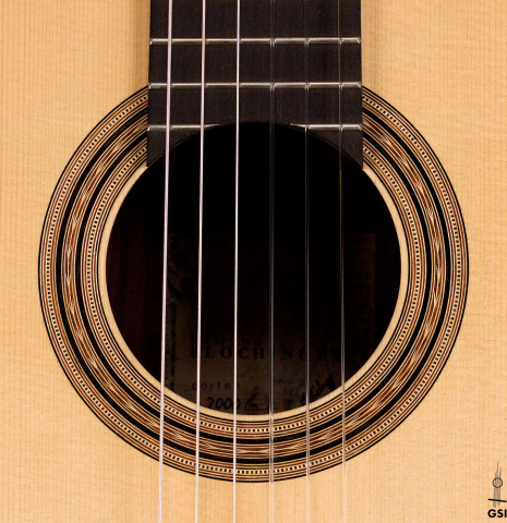 This is a rosette of a 2000 Edmund Blochinger classical guitar made with spruce and csa rosewood