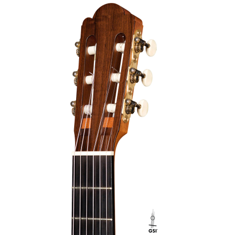 This is a headstock and machine heads of a 2000 Edmund Blochinger classical guitar made with spruce and csa rosewood on a white background