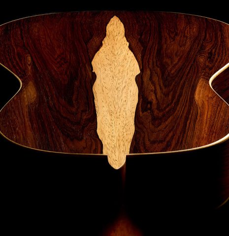The heel, back binding and purfling of a 2003 Edmund Blöchinger classical guitar made of cedar and CSA rosewood