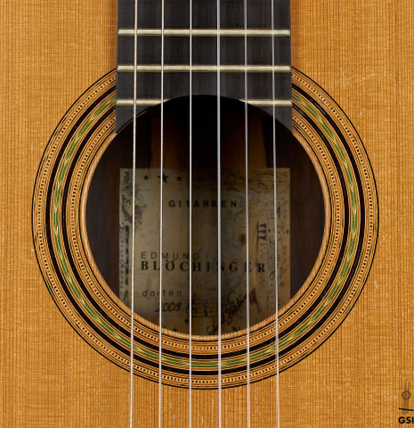 The rosette of a 2003 Edmund Blöchinger classical guitar made of cedar and CSA rosewood