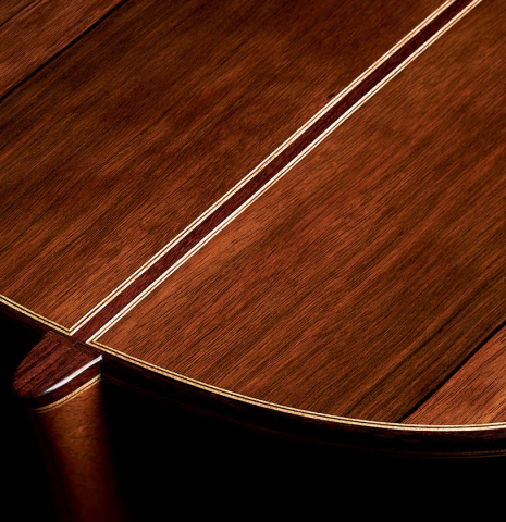 The back, sides and heel of a 2023 Elias Bonet classical guitar made of cedar and green ebony