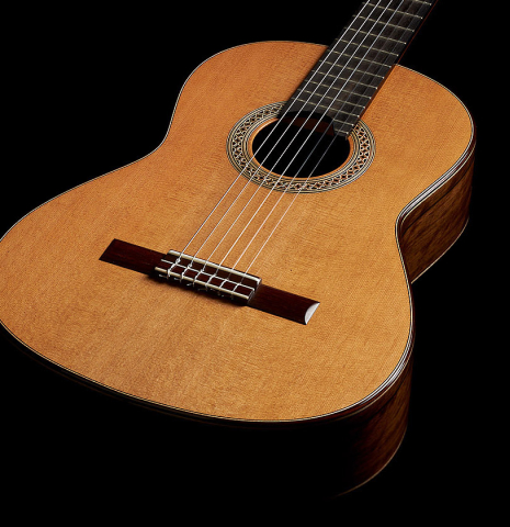 The soundboard and sides of a 2023 Elias Bonet classical guitar made of cedar and green ebony