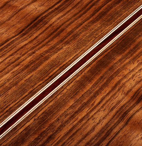 The back center seam of a 2025 Elias Bonet classical guitar made of cedar and green ebony