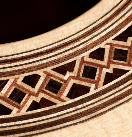 The close-up of a rosette of a 2023 Elias Bonet classical guitar made with spruce top and African rosewood back and sides
